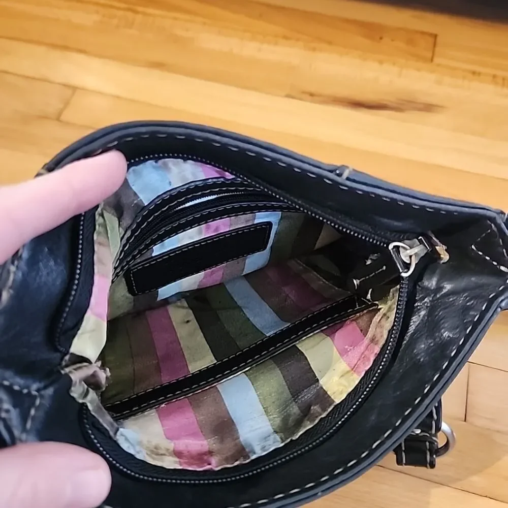 Tignanello black leather Crossbody purse W/accent stitching